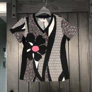 Woman’s White Cross scrubs top Size Small